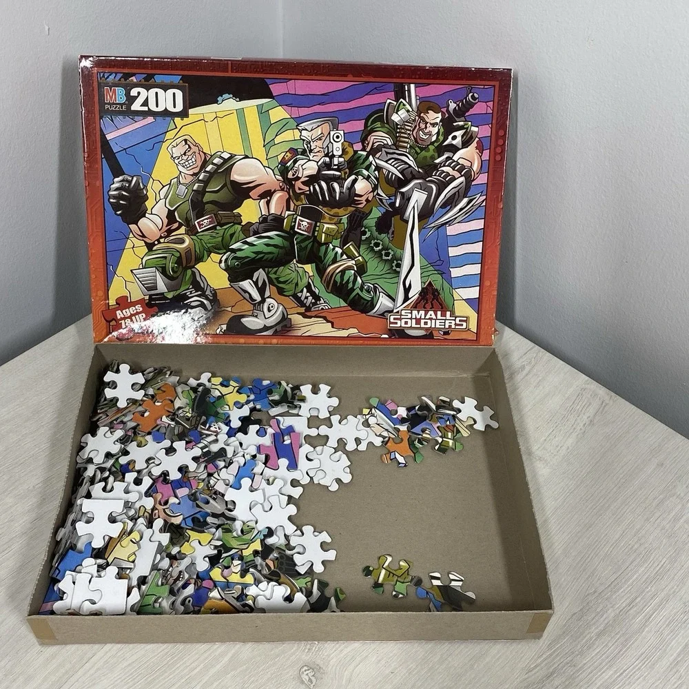 Lot of Two Vintage 1998 Milton Bradley Small Soldiers Glow Dark 200pc Puzzles